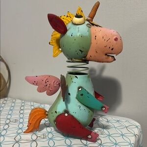 Colorful Metal Unicorn Sculpture some rust